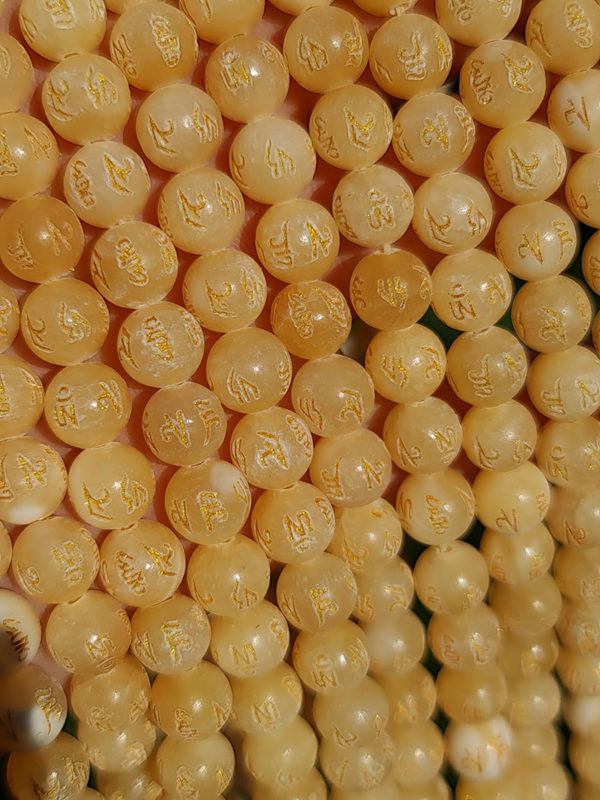 Perles calcite jaune gravée