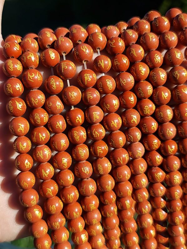 Perles jaspe rouge gravée