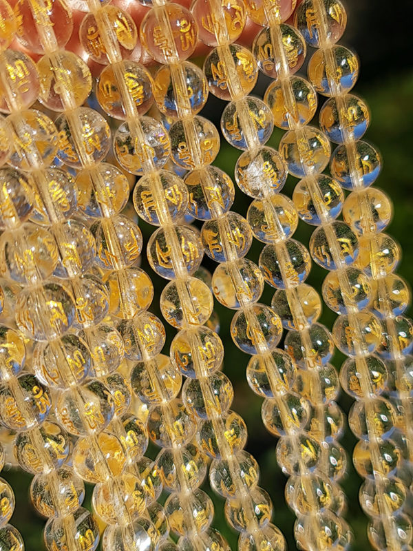 Perles cristal de roche gravée