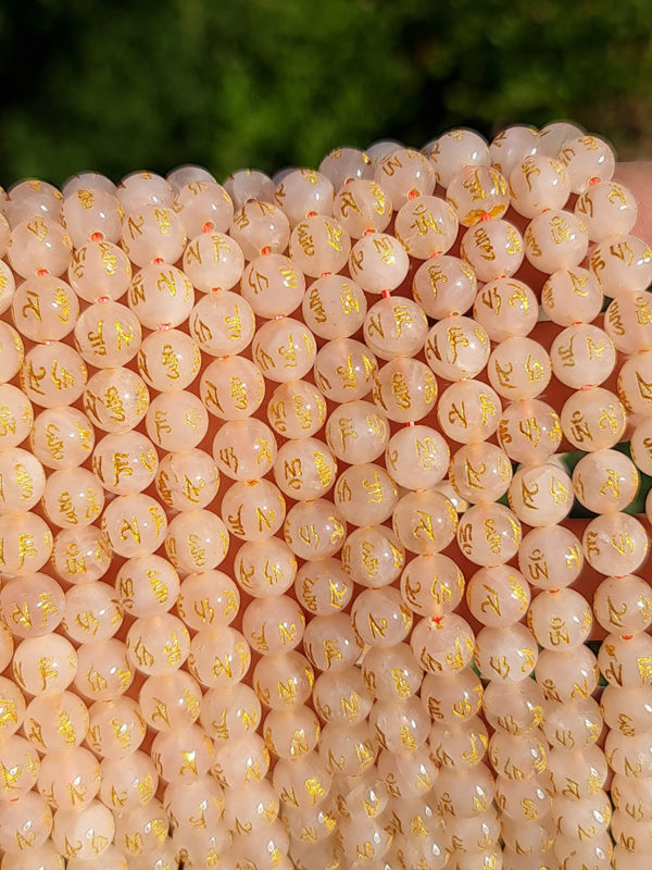 Perles quartz rose gravé