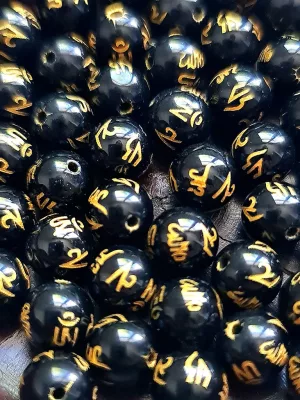 perles onyx gravé "om mani padme hum" 8mm