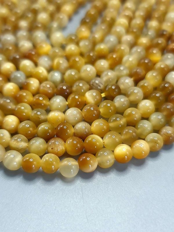 Perles oeil de tigre dorée 4mm